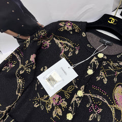 Cardigan tricoté à fleurs et oiseaux