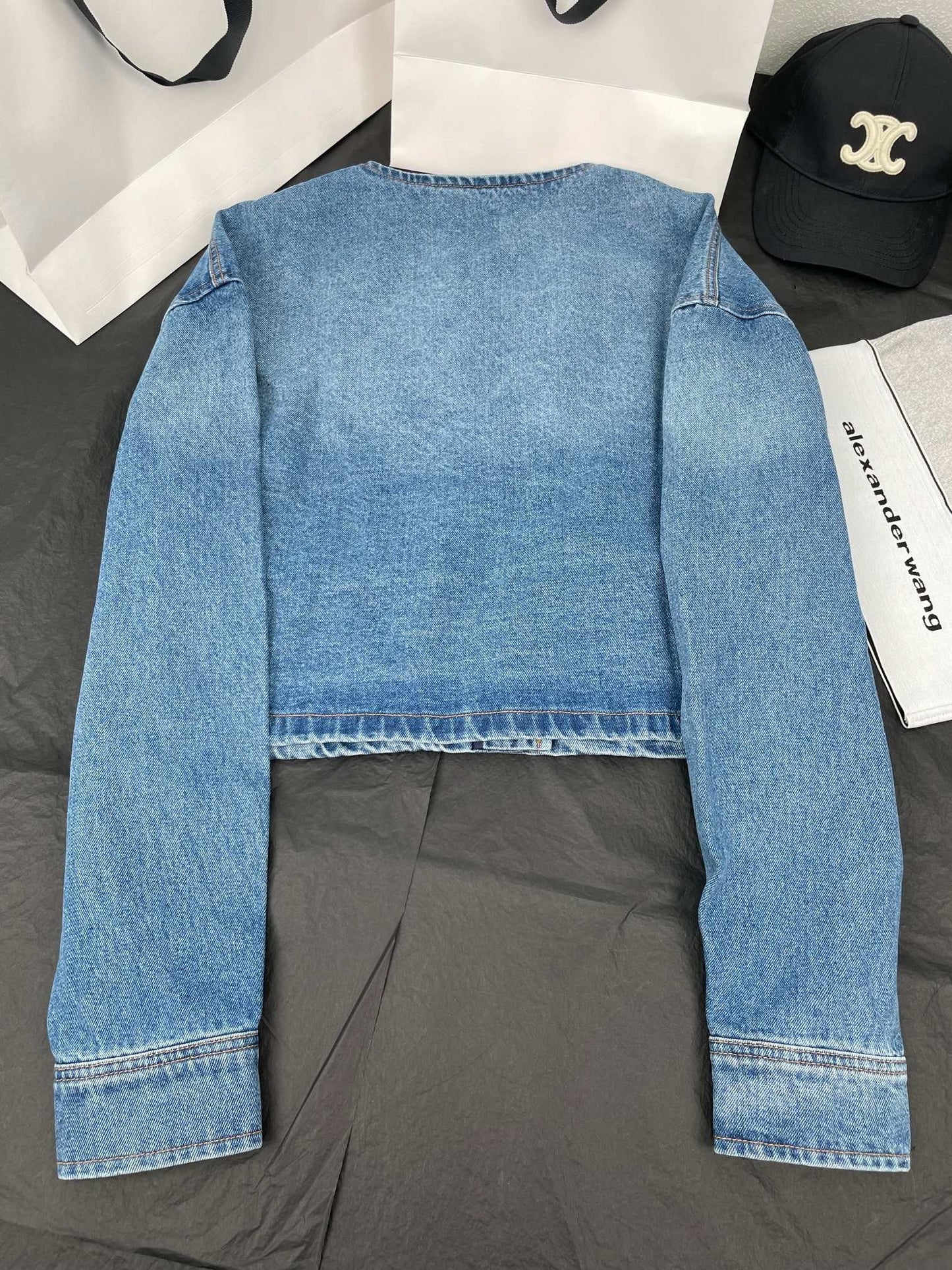 Veste ceinturée en jean délavé
