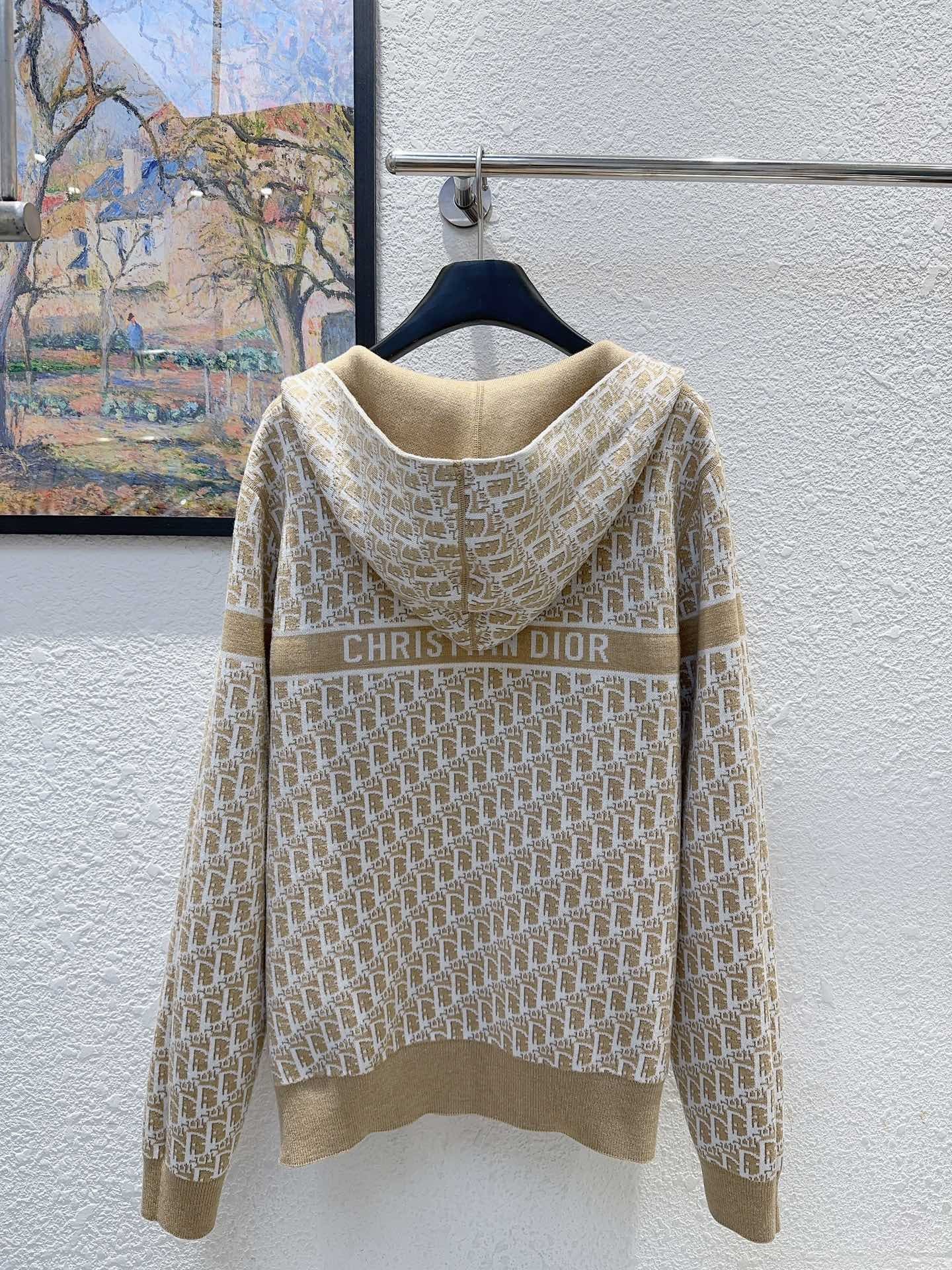 Wendbare Jacquard-Wolljacke mit Kapuze und Reißverschluss