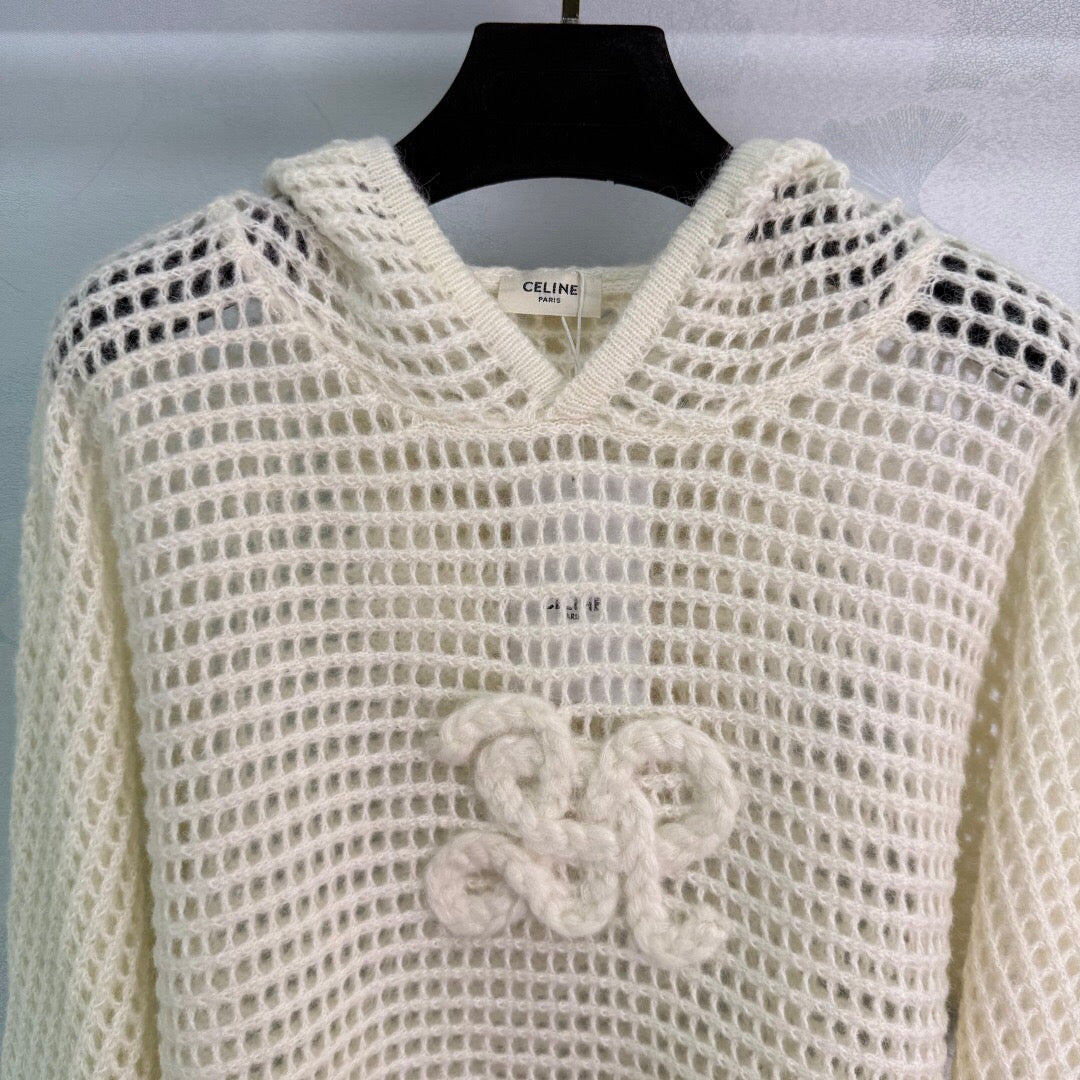 New early autumn hooded hollow knit sweater