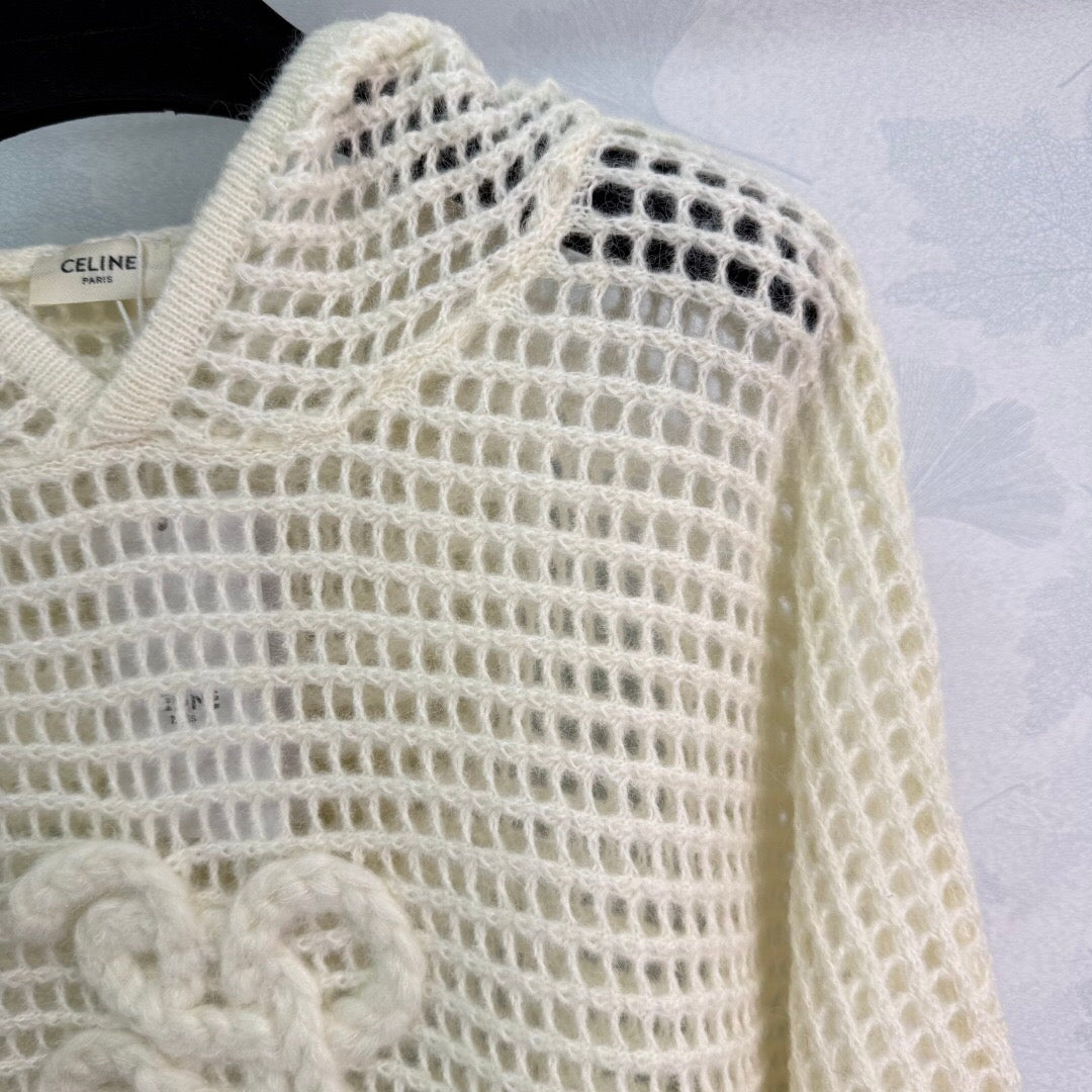 New early autumn hooded hollow knit sweater