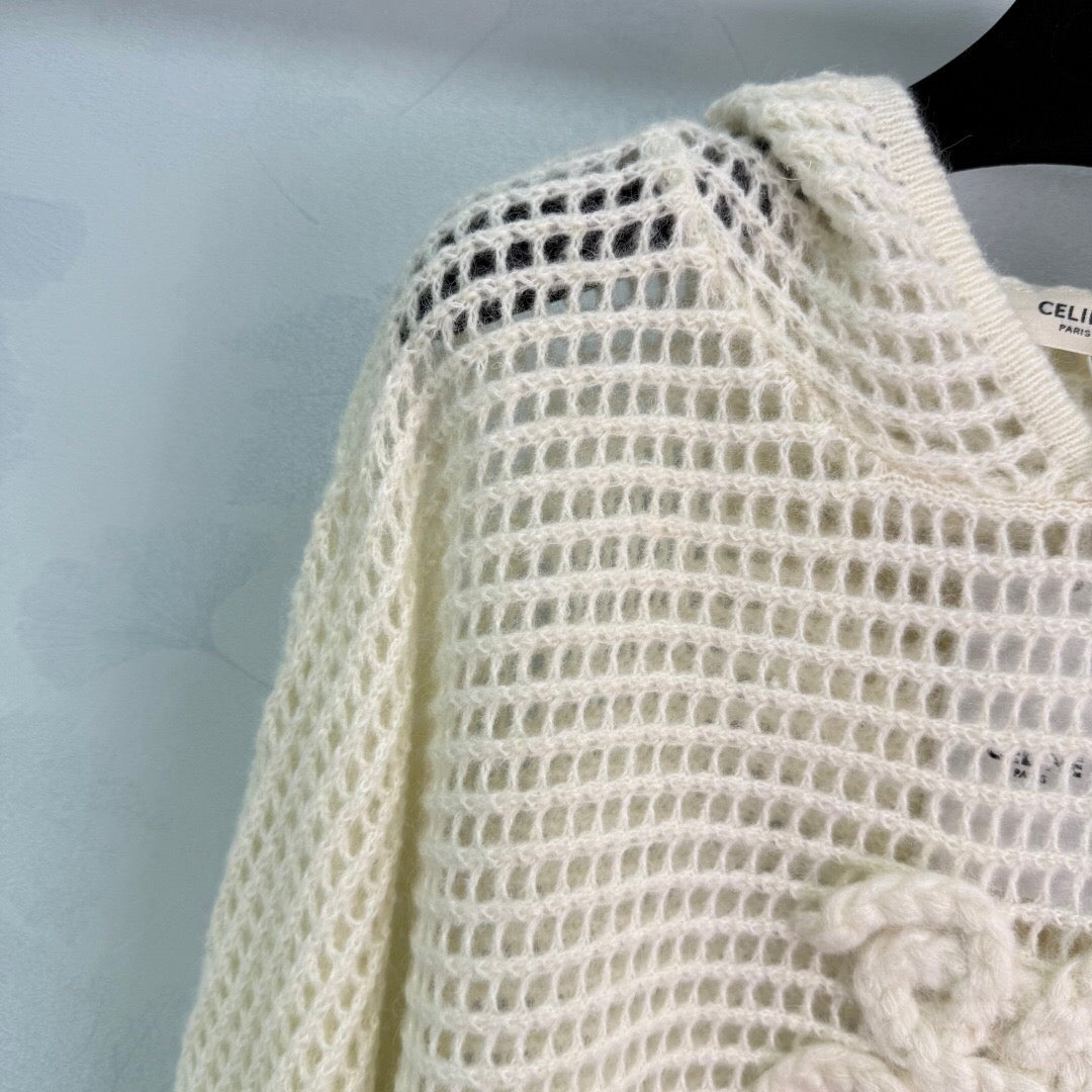 New early autumn hooded hollow knit sweater