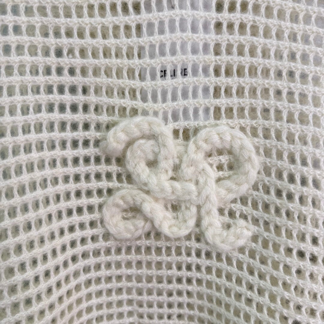 New early autumn hooded hollow knit sweater