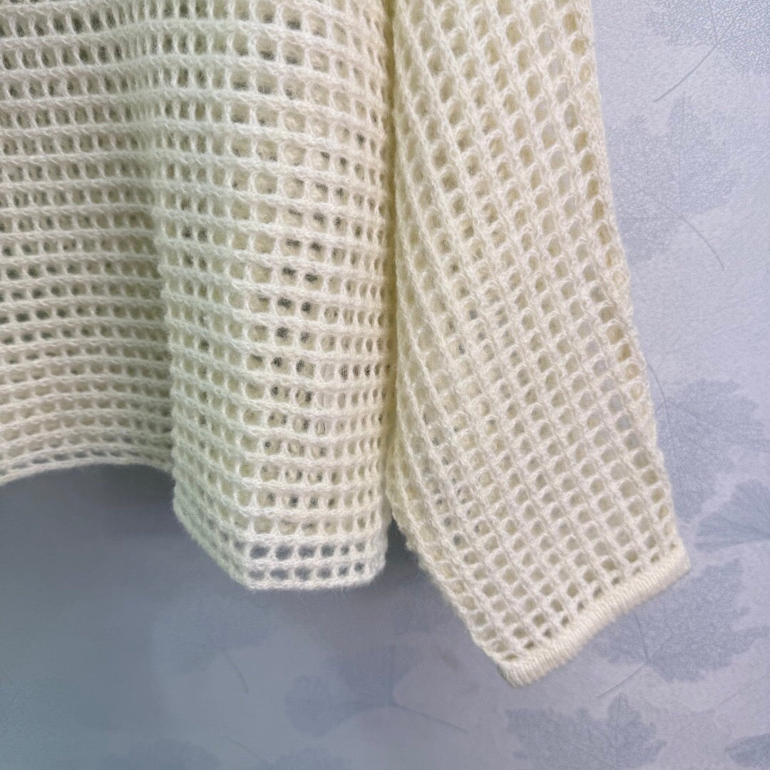 New early autumn hooded hollow knit sweater