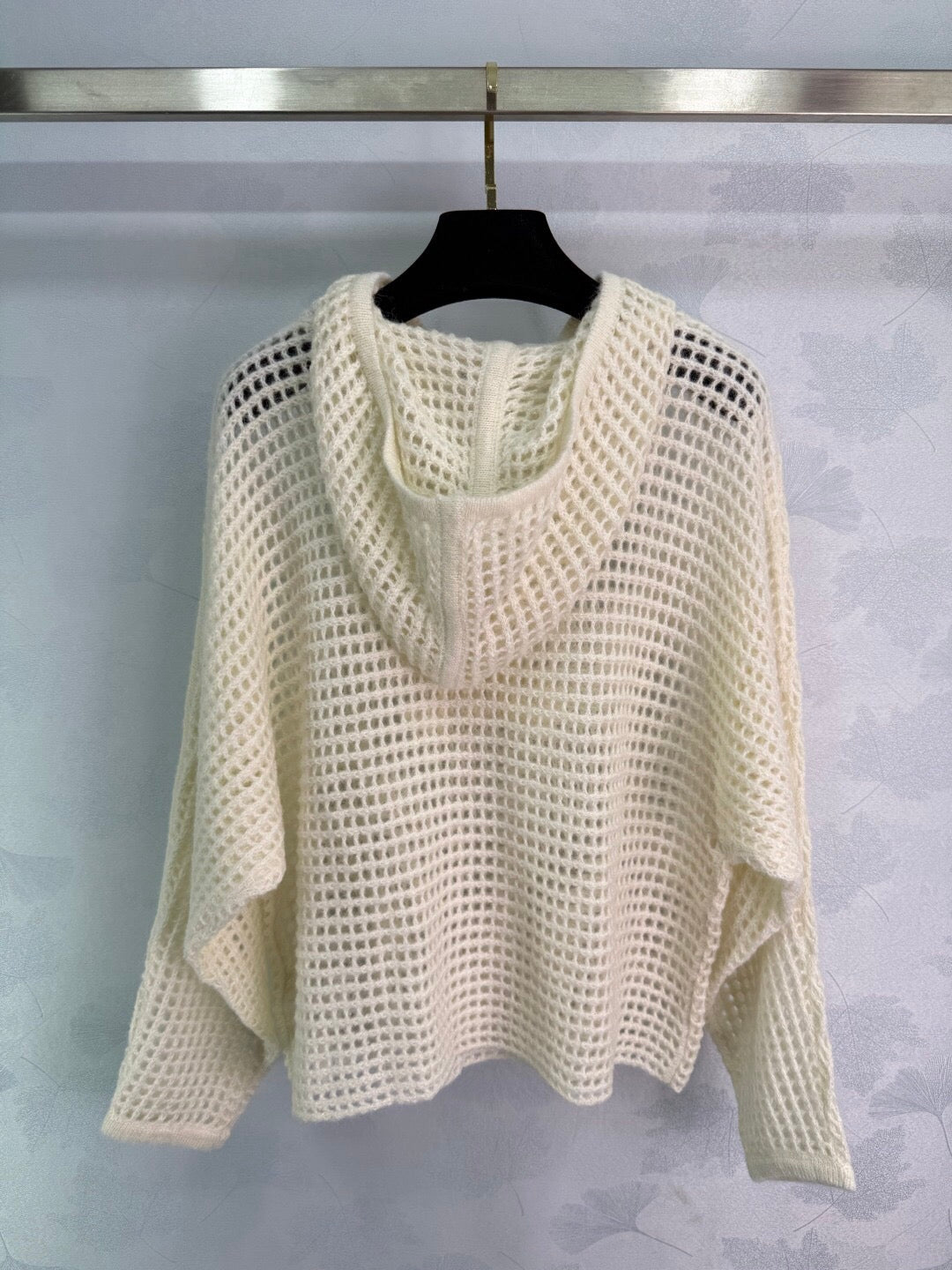 New early autumn hooded hollow knit sweater
