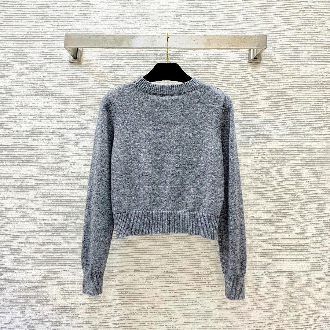 Weiches und hautfreundliches modisches und schlichtes Strickoberteil mit Buchstaben