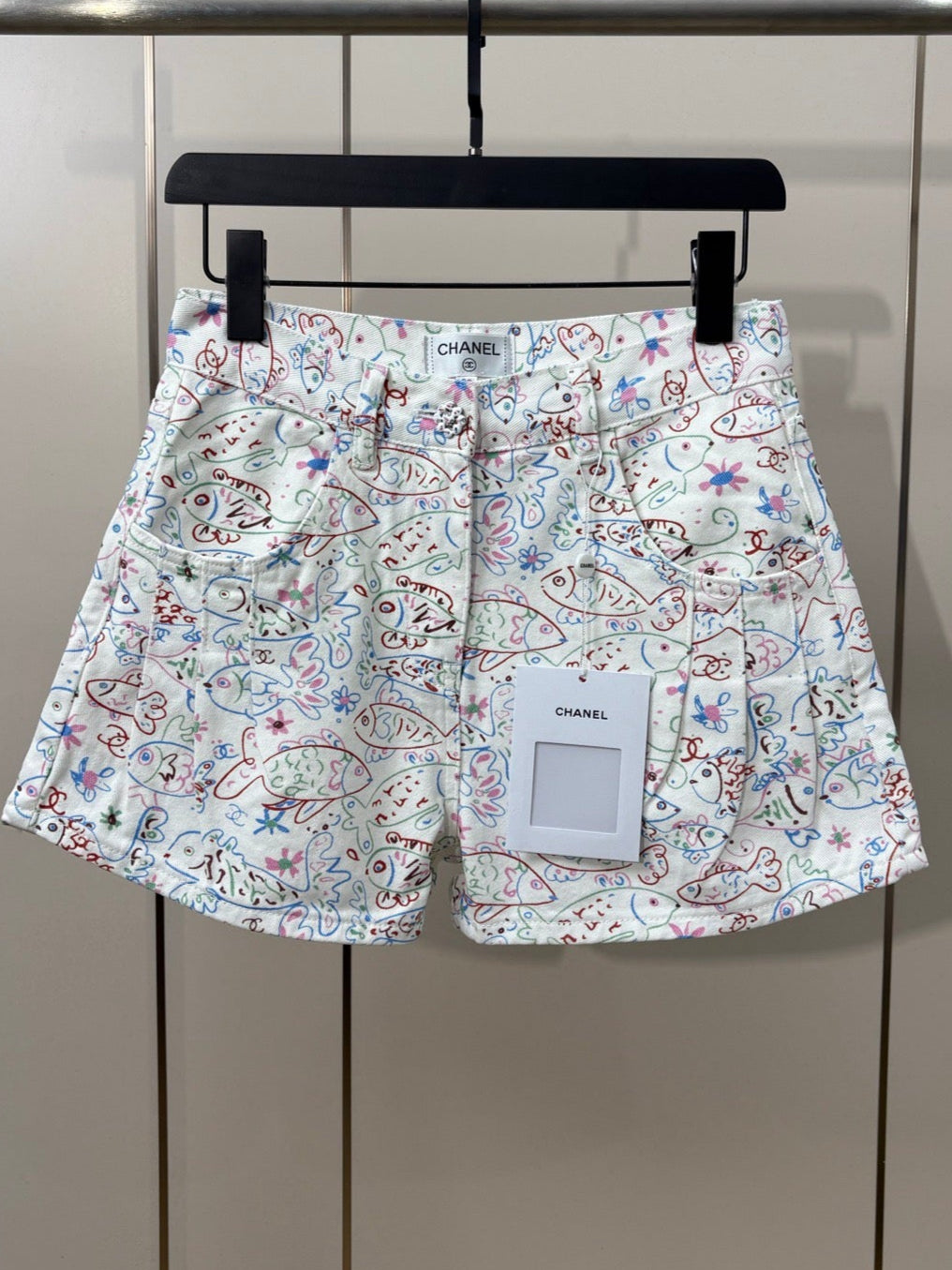 Fish print denim shorts