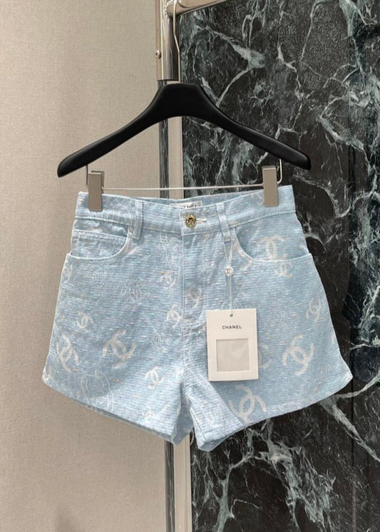 Light-colored jacquard print denim shorts