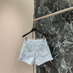 Light-colored jacquard print denim shorts