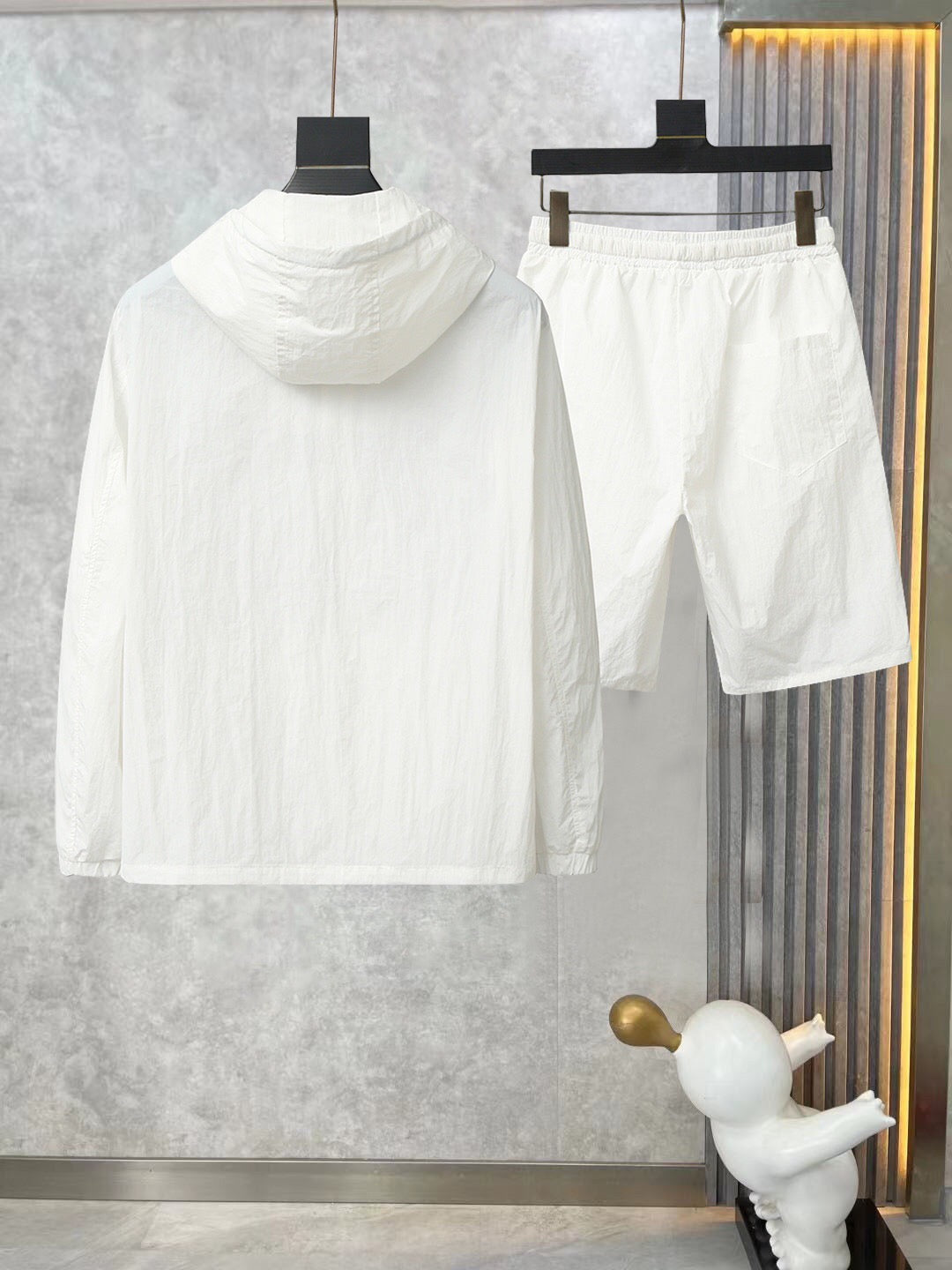 Gleicher Stil für Männer und Frauen. Sommer-Sonnenschutzkleidungs-Shorts-Set