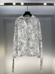Bow print v-neck long sleeve shirt
