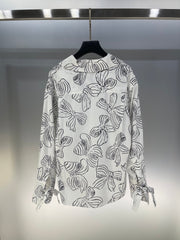 Bow print v-neck long sleeve shirt