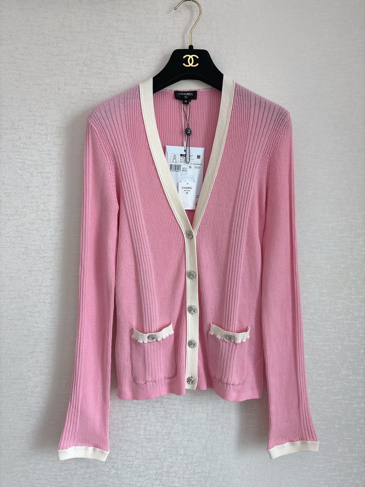 Cardigan rose de la collection Plage