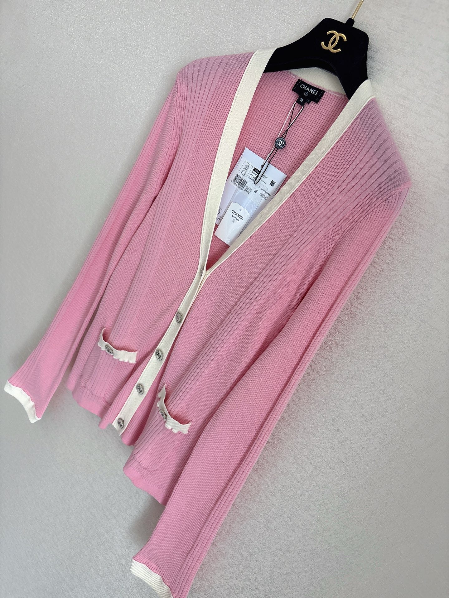 Cardigan rose de la collection Plage