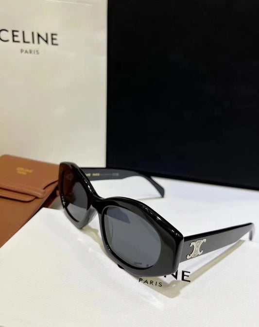 Polygonale schwarz-silberne Brille