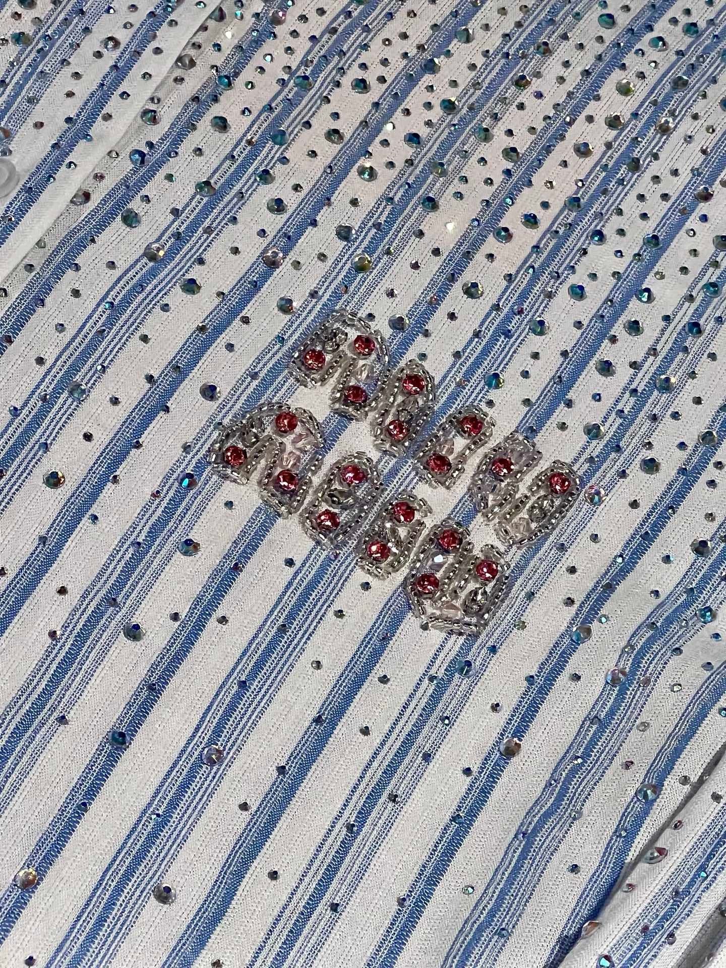 Chemise rayée à épaules tombantes et strass