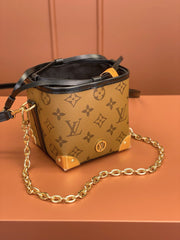 Noé Purse V Charms Monogram Reverse