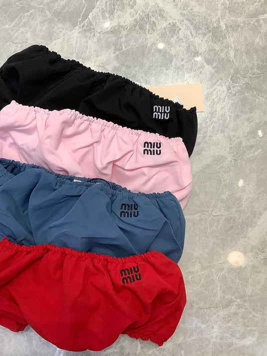 Gerafftes Bandeau-Top in lebendigen Farbtönen 