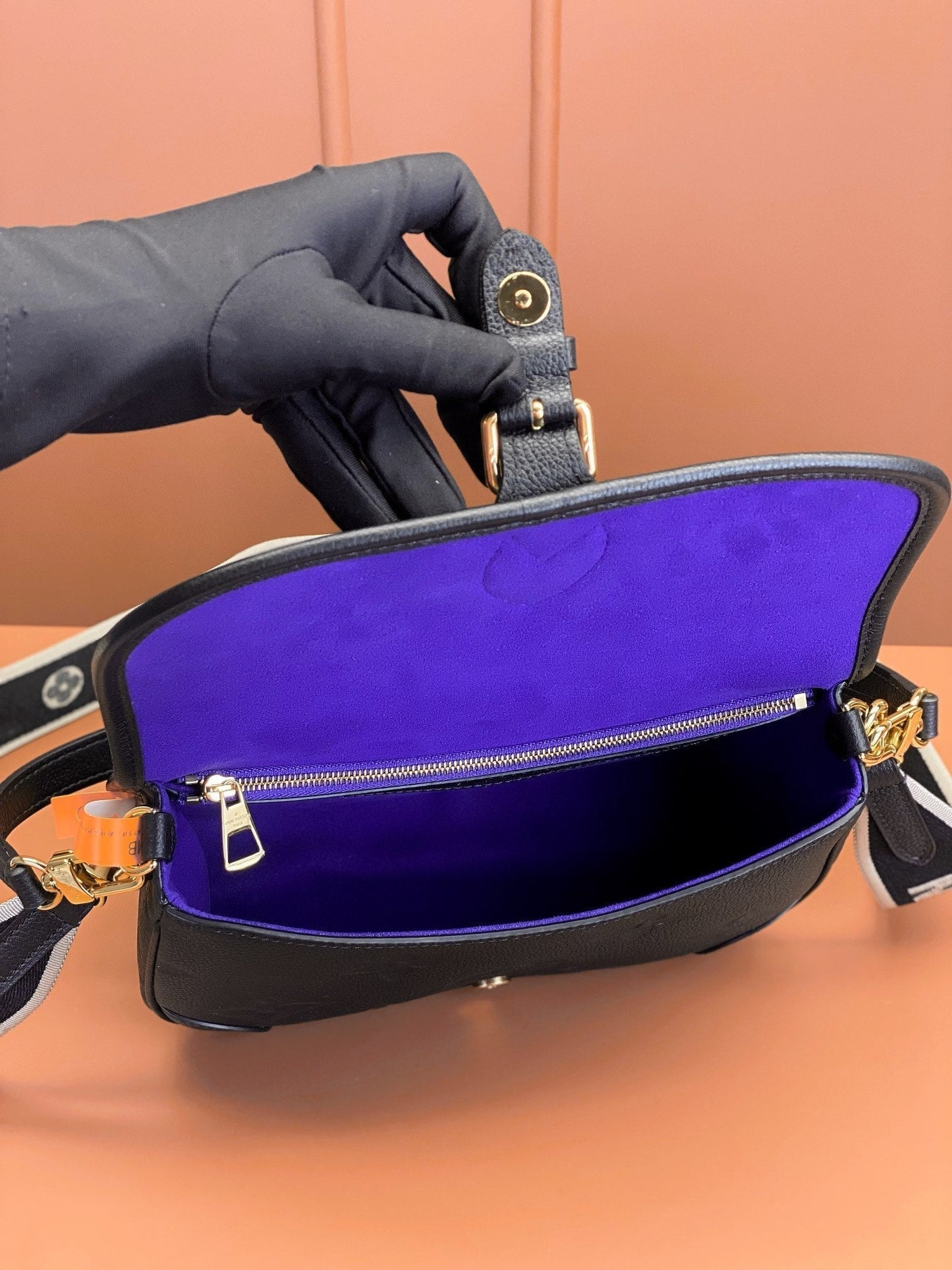 Diane Monogram Empreinte Cuir