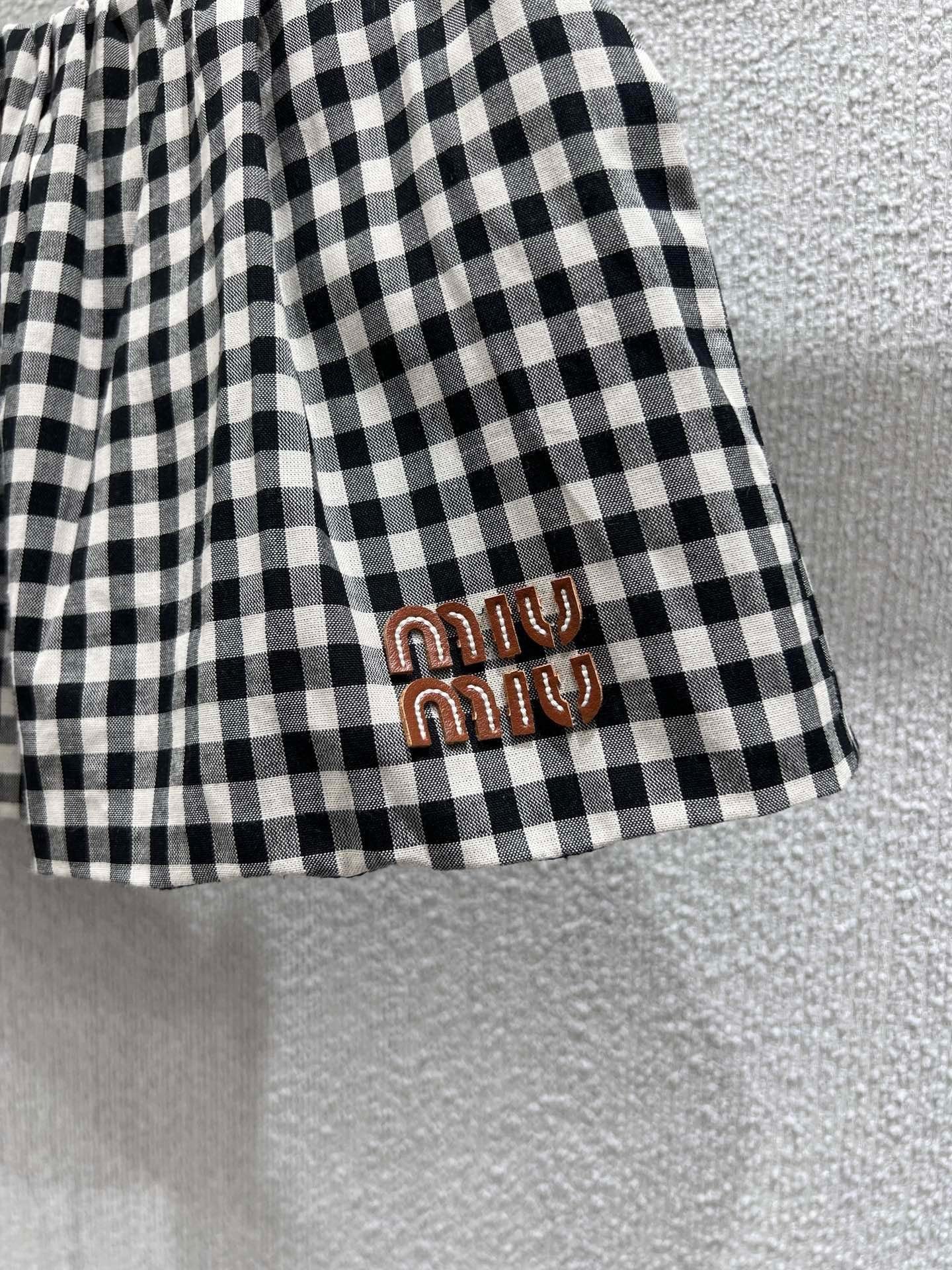 Mini-jupe vichy noire et blanche 