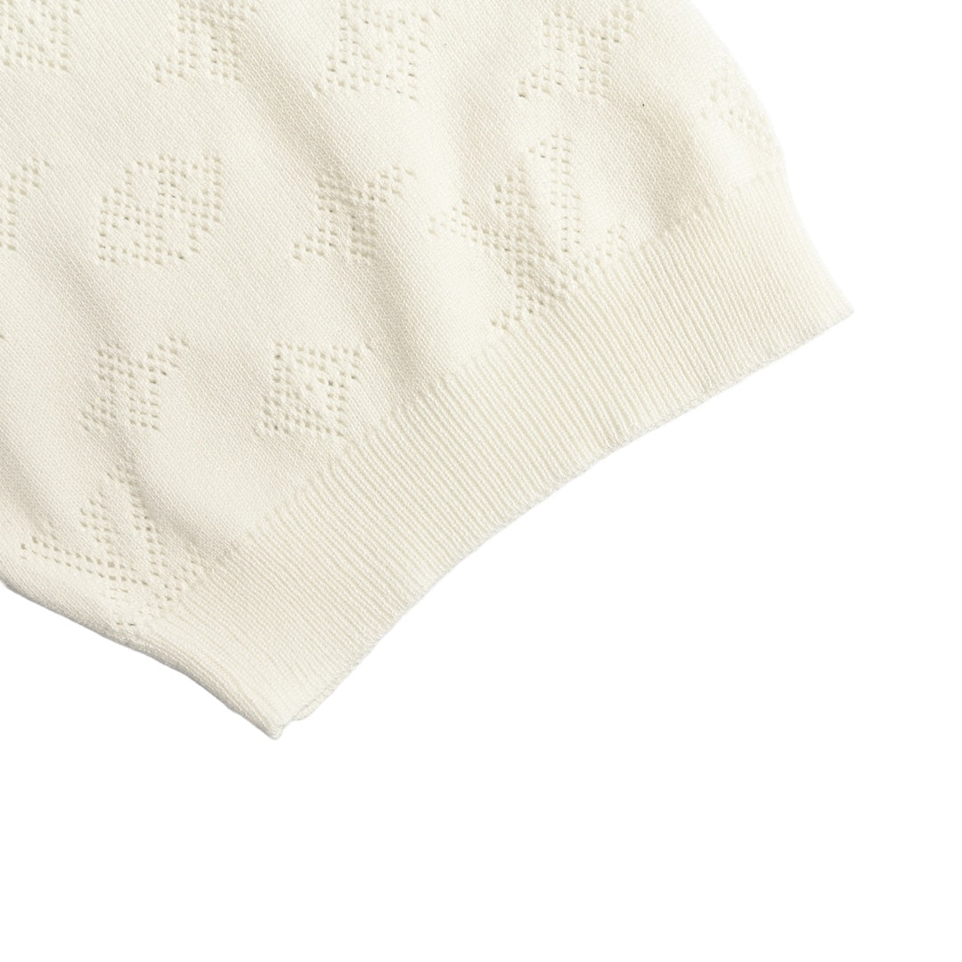 Poloshirt mit kurzen Ärmeln aus Jacquard-Strick mit altem Hohlmuster 