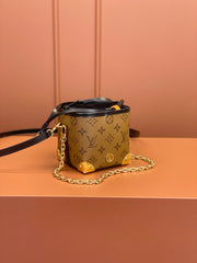 Noé Purse V Charms Monogram Reverse