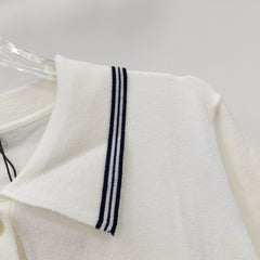 Nouvelle arrivée de manches courtes tricotées à revers de couleur contrastée