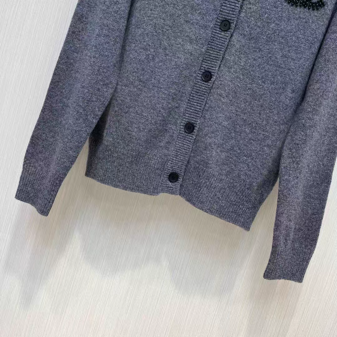 Cardigan doux en tricot avec logo Double C