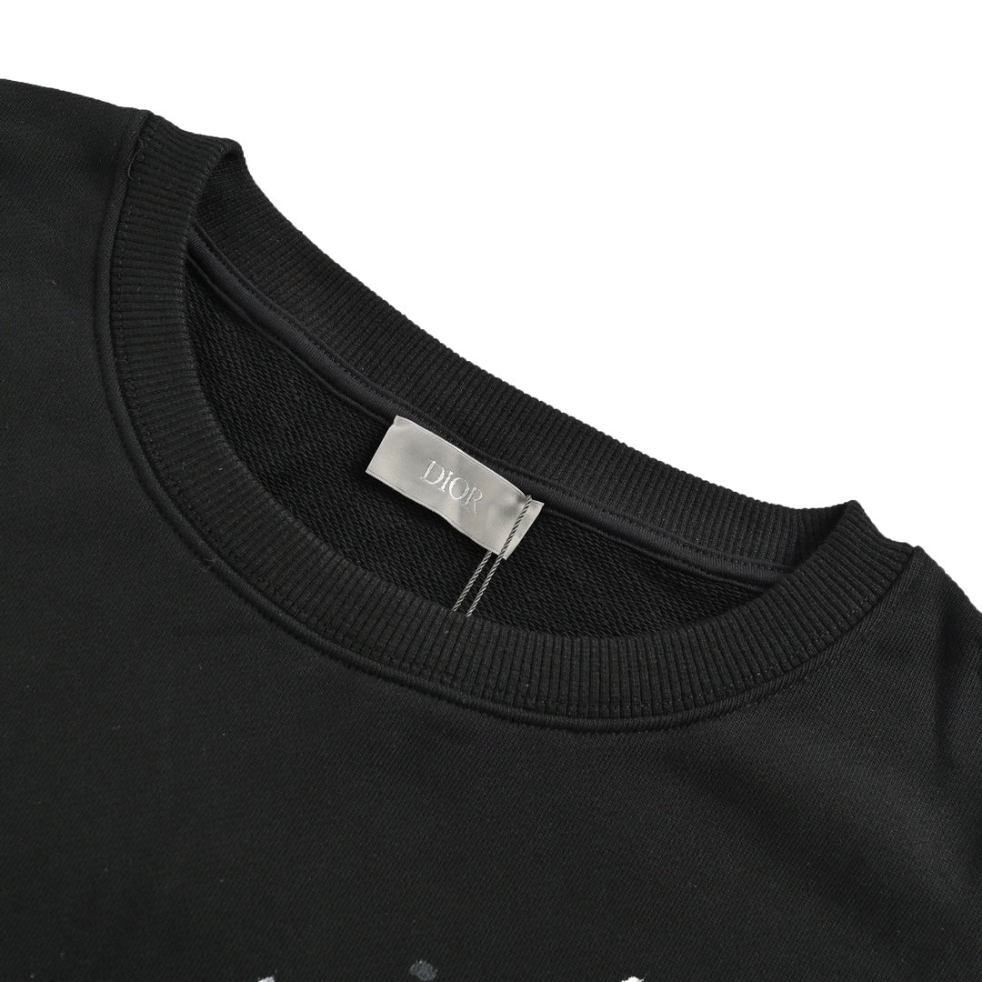 Sweat-shirt col rond à encre peinte co-marquée