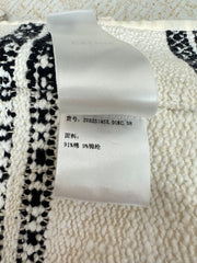 Round neck black and white striped single-row metal button pattern jacket