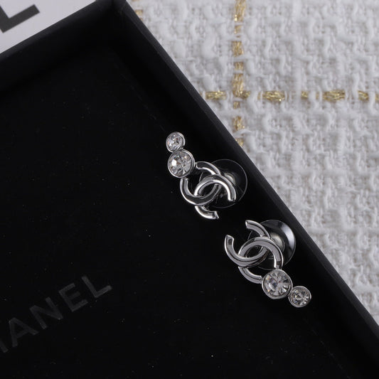 Nouvelles boucles d'oreilles en argent Double C