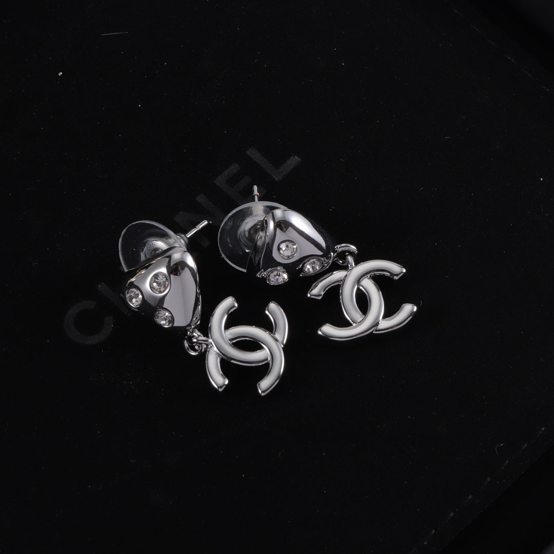 Neue dreieckige Diamant-Goldohrringe